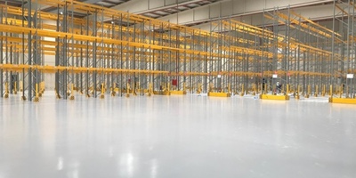 Aplicación de pavimento Multicapa de capa fina antideslizante en Nave industrial de la Empresa Arogreen